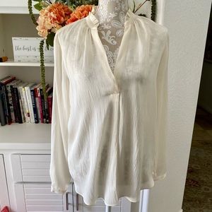 Ann Taylor cream long sleeve V neck top.